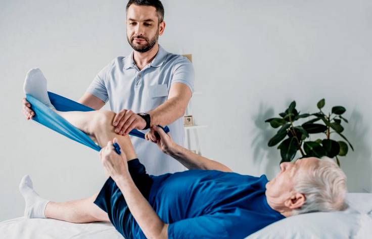 Physiotherapist and patient